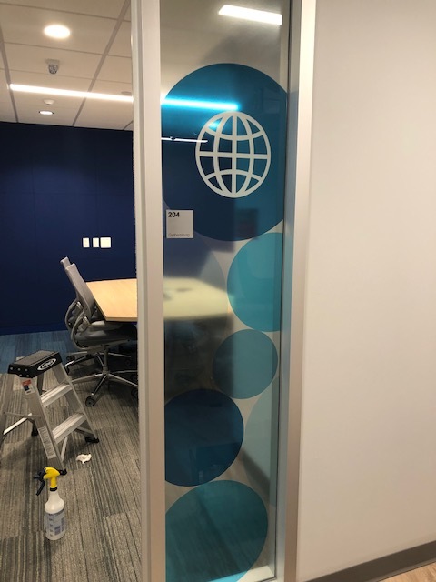 Decorative window film installed on office window