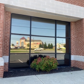 reflective solar film on interior and exterior of building