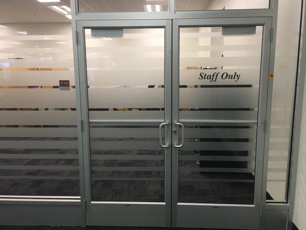 privacy film on staff only section of store